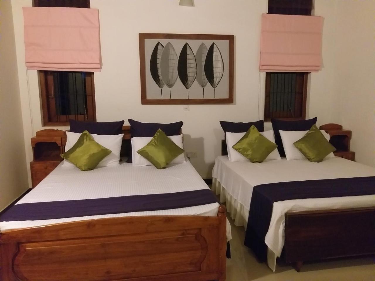 Cosy Nest Home Stay 니곰보 객실 사진