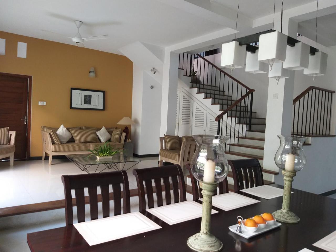Cosy Nest Home Stay 니곰보 객실 사진