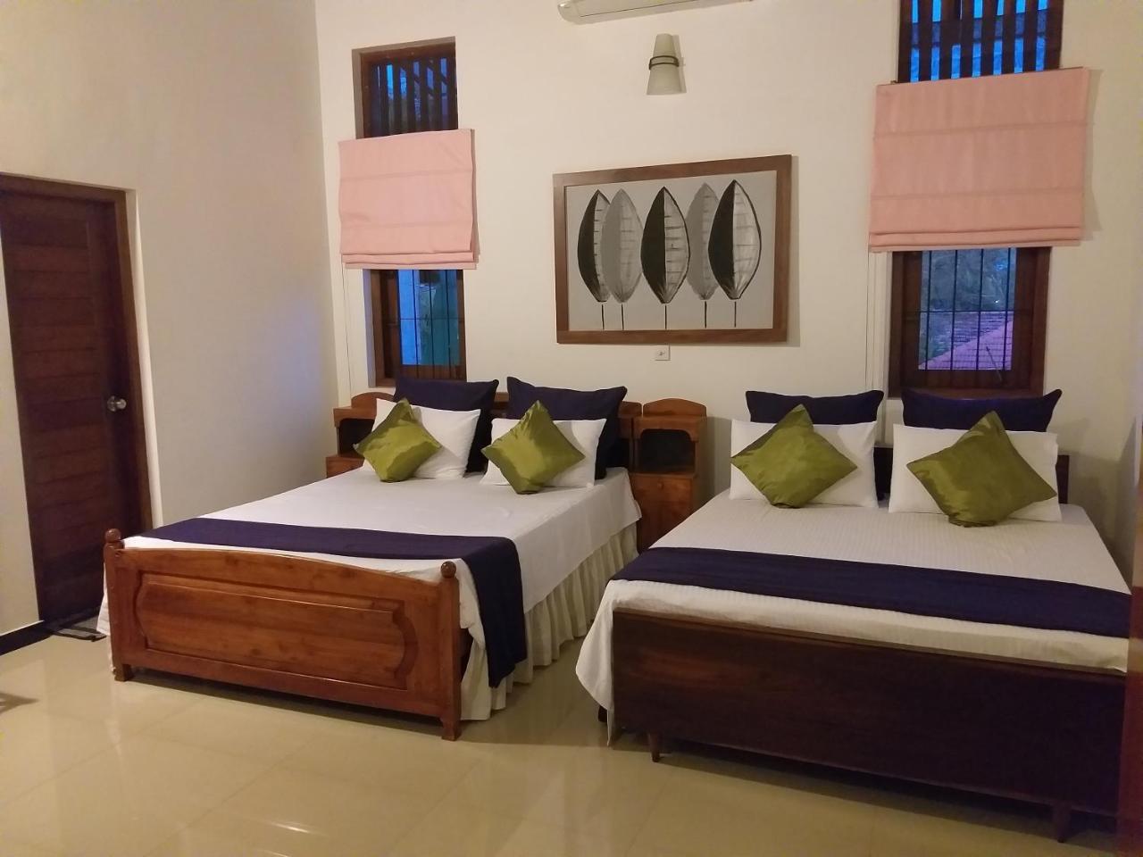 Cosy Nest Home Stay 니곰보 객실 사진